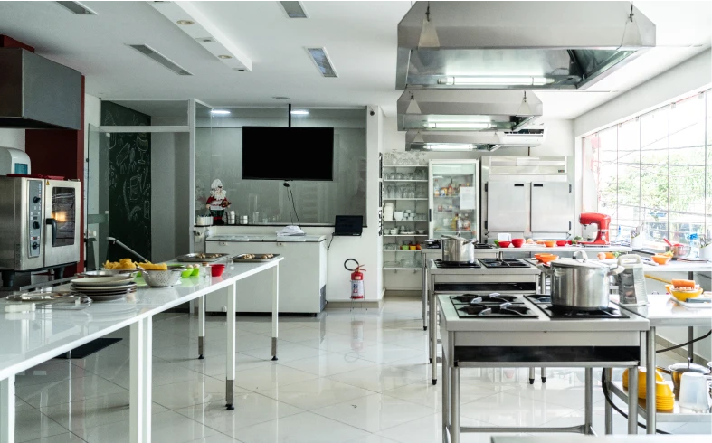 Spacious culinary workspace with appliances
