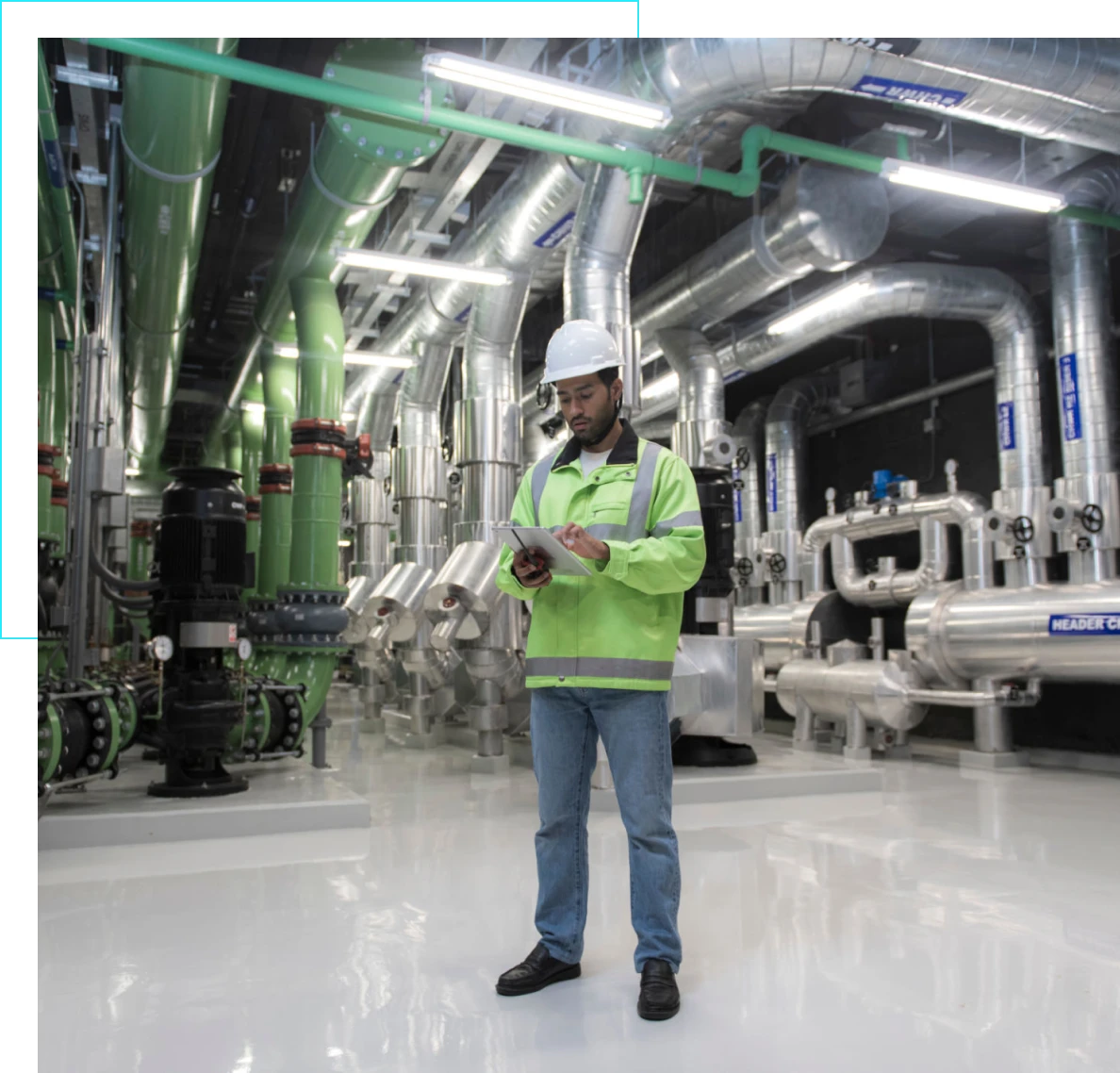 Engineer inspecting industrial machinery